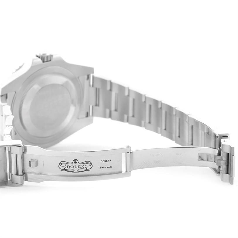 The image shows the back case and open clasp with logo and inscriptions of a Rolex GMT-Master 116710 Men's Stainless Steel Black Dial 116710 Men's Stainless Steel Black Dial watch.