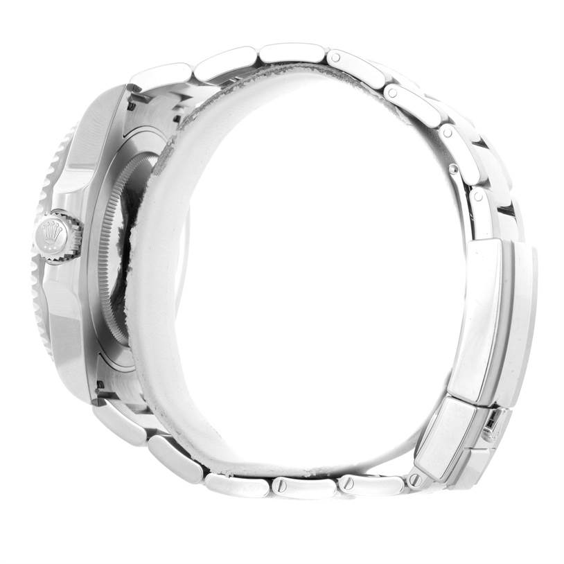 The image shows a side view of a Rolex GMT-Master 116710 Men's Stainless Steel Black Dial 116710 Men's Stainless Steel Black Dial watch, featuring its case, crown, and metal bracelet.