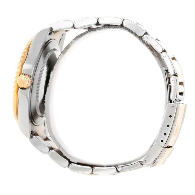 The Rolex GMT-Master 16713 Men's Stainless Steel Black Dial 16713 Men's Stainless Steel Black Dial watch is shown from a side angle, highlighting the bracelet, crown, and side of the case.