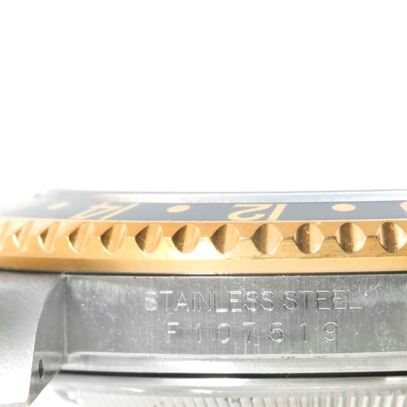 This image shows a close-up side view of a Rolex GMT-Master 16713 Men's Stainless Steel Black Dial 16713 Men's Stainless Steel Black Dial watch, focusing on the stainless steel case and partially visible bezel.