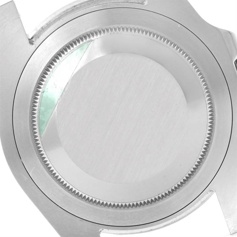 This image shows the back case of a Rolex GMT-Master 116710 Men's Stainless Steel Black Dial 116710 Men's Stainless Steel Black Dial watch from a top-down angle.