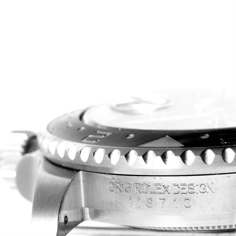 The image shows a close-up side view of the bezel, case, crown, and engraved model number of the Rolex GMT-Master 116710 Men's Stainless Steel Black Dial 116710 Men's Stainless Steel Black Dial.