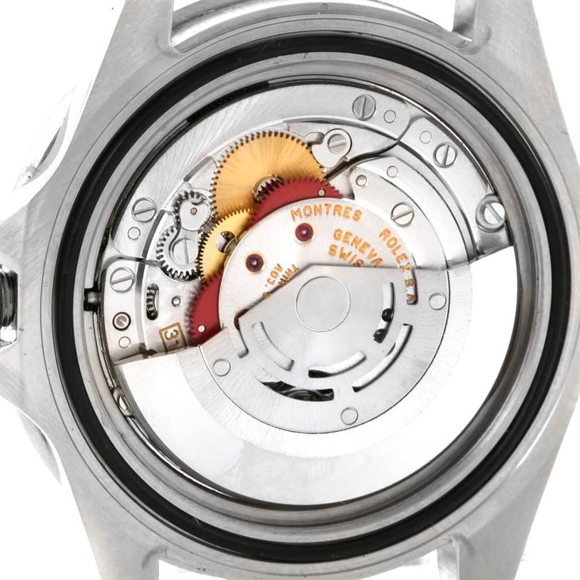 The image shows the back view of a Rolex GMT-Master 16700 Men's Stainless Steel Black Dial 16700 Men's Stainless Steel Black Dial watch, displaying its intricate mechanical movement.