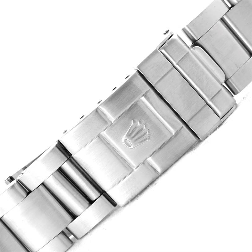 This image shows the clasp and part of the bracelet of a Rolex GMT-Master 16710 Men's Stainless Steel Black Dial 16710 Men's Stainless Steel Black Dial watch viewed from a top-down angle.