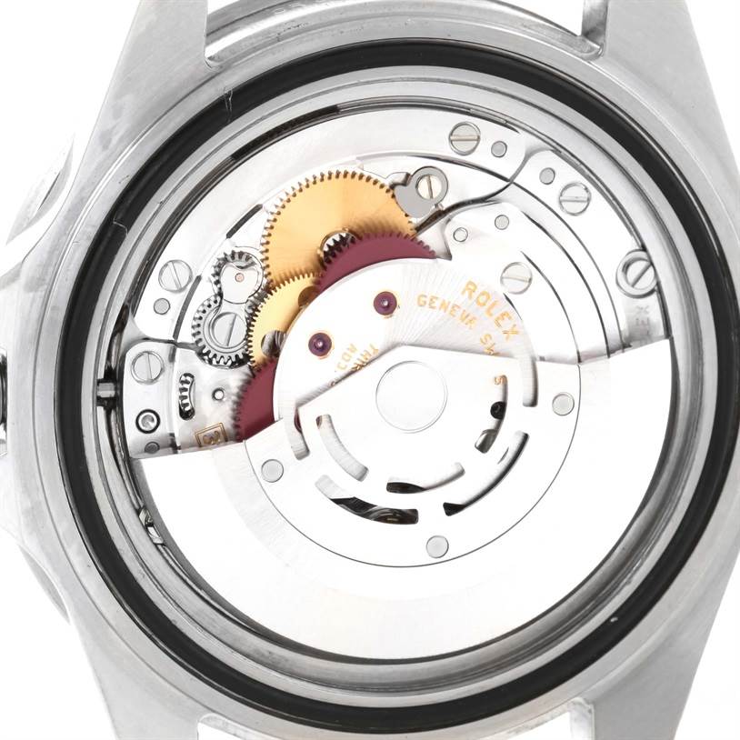 This image shows the back view of the Rolex GMT-Master 16710 Men's Stainless Steel Black Dial 16710 Men's Stainless Steel Black Dial watch, focusing on its intricate movement and rotor mechanism.