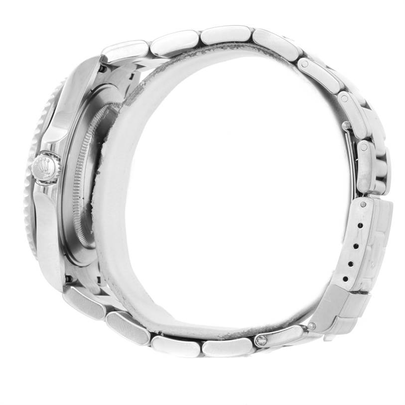 The image shows a side view of the Rolex GMT-Master 16710 Men's Stainless Steel Black Dial 16710 Men's Stainless Steel Black Dial watch, highlighting the case, crown, and metal bracelet.