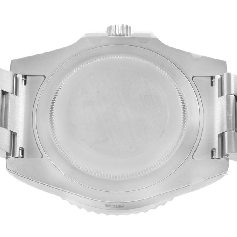 This image shows the case back and part of the bracelet of a Rolex GMT-Master 116710 Men's Stainless Steel Black Dial 116710 Men's Stainless Steel Black Dial watch from a rear angle.