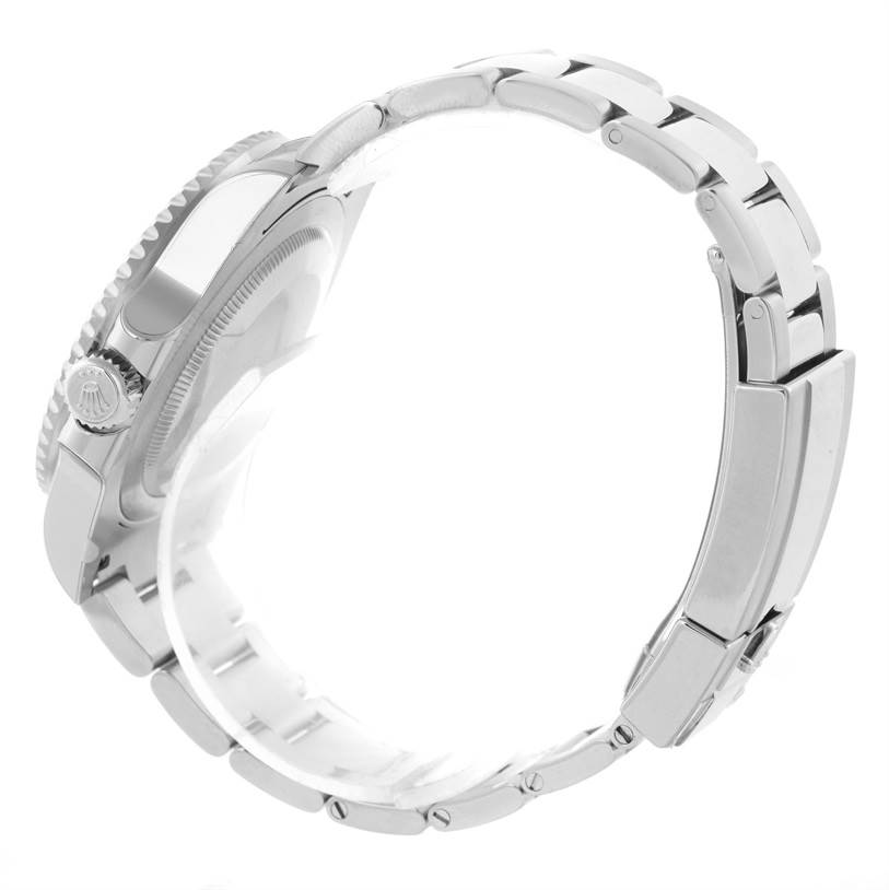 This side-angle image of a Rolex GMT-Master 116710 Men's Stainless Steel Black Dial 116710 Men's Stainless Steel Black Dial shows the watch crown, bezel, and bracelet.