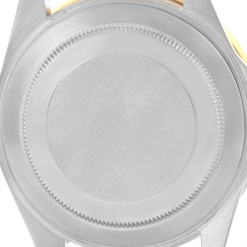 The image shows the back case of a Rolex GMT-Master 16713 Men
s Stainless Steel Black Dial 16713 Men
s Stainless Steel Black Dial watch viewed from the rear.