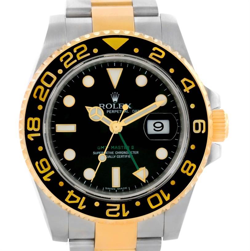 The image shows a close-up of the front of a Rolex GMT-Master 116713LN Men's Stainless Steel Black Dial 116713LN Men's Stainless Steel Black Dial watch, highlighting the dial, bezel, and part of the bracelet.