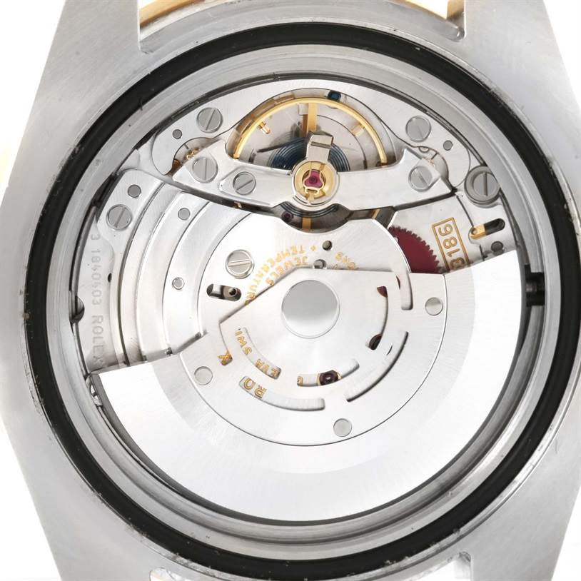 This image shows the movement and internal components of a Rolex GMT-Master 116713LN Men's Stainless Steel Black Dial 116713LN Men's Stainless Steel Black Dial watch, viewed from the back.