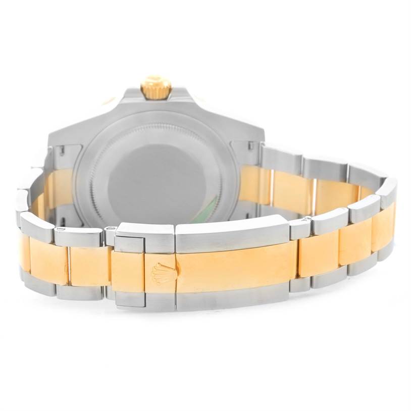 The image shows the back casing and bracelet of a Rolex GMT-Master 116713LN Men's Stainless Steel Black Dial 116713LN Men's Stainless Steel Black Dial watch, featuring a two-tone metal design.