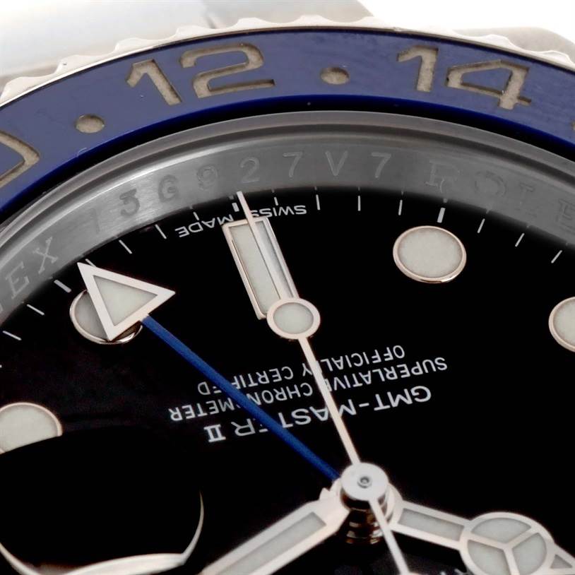 The image shows a close-up of the dial and bezel of a Rolex GMT-Master 116710BLNR Men's Stainless Steel Black Dial 116710BLNR Men's Stainless Steel Black Dial II, highlighting its markers and hands.