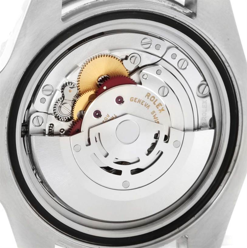 This image shows the internal movement mechanism of a Rolex GMT-Master 116710BLNR Men's Stainless Steel Black Dial 116710BLNR Men's Stainless Steel Black Dial watch, viewed from the back.