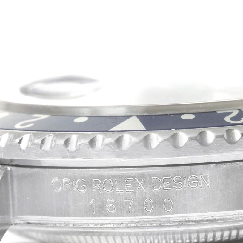 The image shows a close-up side view of the bezel and case with the engraved model number "16700" on the Rolex GMT-Master 16700 Men's Stainless Steel Black Dial 16700 Men's Stainless Steel Black Dial watch.