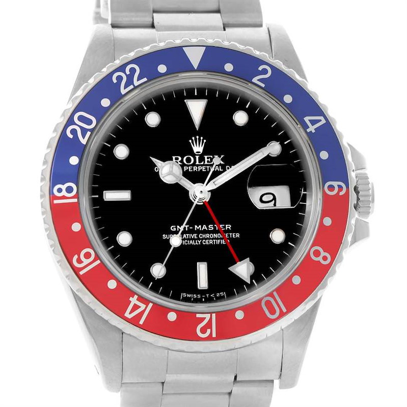 The Rolex GMT-Master watch is shown from a front angle, highlighting its bezel, dial, hands, and bracelet.