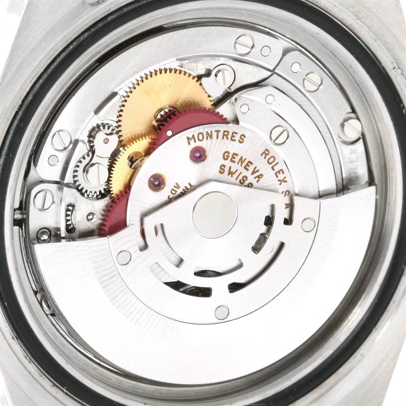 This image shows the movement and internal mechanics of a Rolex GMT-Master 16700 Men's Stainless Steel Black Dial 16700 Men's Stainless Steel Black Dial watch from a top-down angle.