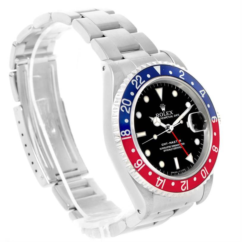 The image shows a Rolex GMT-Master 16700 Men's Stainless Steel Black Dial 16700 Men's Stainless Steel Black Dial watch with a stainless steel band and a "Pepsi" blue and red bezel, at an oblique angle.