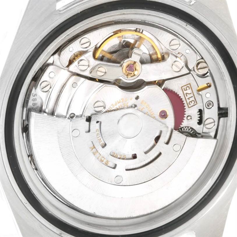 This image shows the back view of a Rolex GMT-Master 16700 Men's Stainless Steel Black Dial 16700 Men's Stainless Steel Black Dial watch, featuring the intricate details of its movement mechanism.