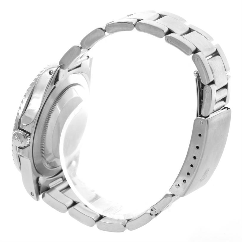 The image shows a side view of a Rolex GMT-Master 16700 Men's Stainless Steel Black Dial 16700 Men's Stainless Steel Black Dial watch, highlighting the bracelet and clasp.