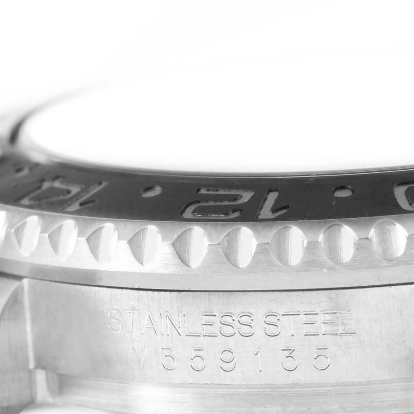 This image shows a close-up of the bezel and case side of a Rolex GMT-Master 116710 Men
s Stainless Steel Black Dial 116710 Men
s Stainless Steel Black Dial, highlighting the "Stainless Steel" engraving.