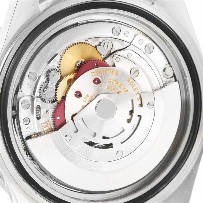This is a close-up view of the movement mechanism inside a Rolex GMT-Master 16710 Men's Stainless Steel Black Dial 16710 Men's Stainless Steel Black Dial watch.