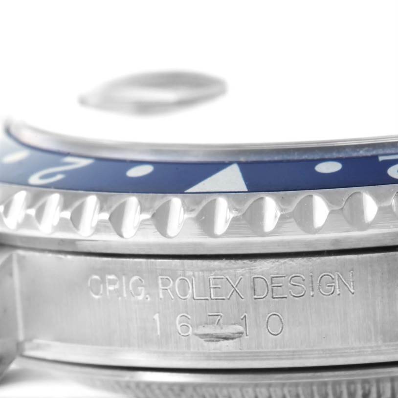 This close-up image shows the side view of the bezel and case, along with the model engraving of the Rolex GMT-Master 16710 Men's Stainless Steel Black Dial 16710 Men's Stainless Steel Black Dial watch.