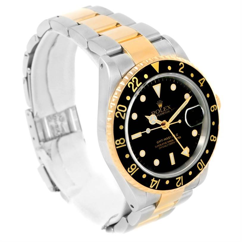 The image shows a Rolex GMT-Master 16713 Men's Stainless Steel Black Dial 16713 Men's Stainless Steel Black Dial watch at a 3/4 angle view, highlighting the face, bezel, and two-tone bracelet.