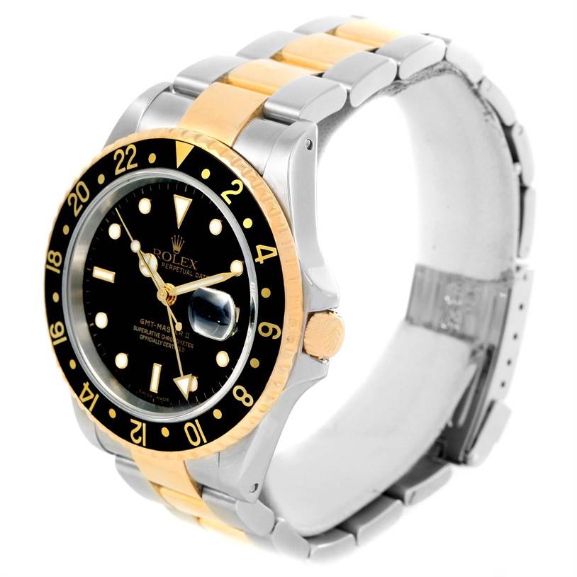 The Rolex GMT-Master 16713 Men's Stainless Steel Black Dial 16713 Men's Stainless Steel Black Dial watch is shown from a three-quarter angle, highlighting the dial, bezel, and bracelet.