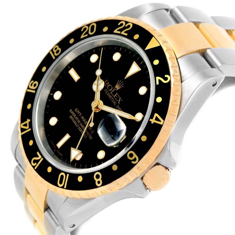 The Rolex GMT-Master 16713 Men's Stainless Steel Black Dial 16713 Men's Stainless Steel Black Dial watch is shown at an angled close-up, highlighting the bezel, dial, and crown.