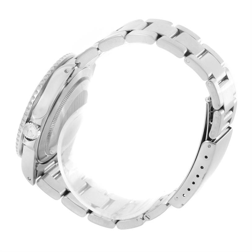 The image shows a side view of a Rolex GMT-Master 16710 Men's Stainless Steel Black Dial 16710 Men's Stainless Steel Black Dial watch, highlighting its stainless steel bracelet, crown, and case.