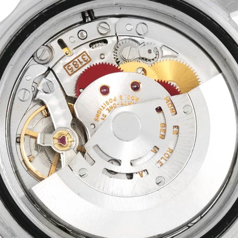 This is an image of the interior mechanism of a Rolex GMT-Master 16710 Men's Stainless Steel Black Dial 16710 Men's Stainless Steel Black Dial watch, showing its intricate movement components.