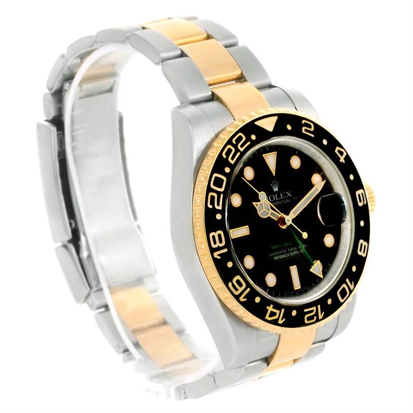This image shows a Rolex GMT-Master 116713 Men
s Stainless Steel Black Dial 116713 Men
s Stainless Steel Black Dial watch at a three-quarter angle, featuring its bezel, dial, case, and two-tone strap.