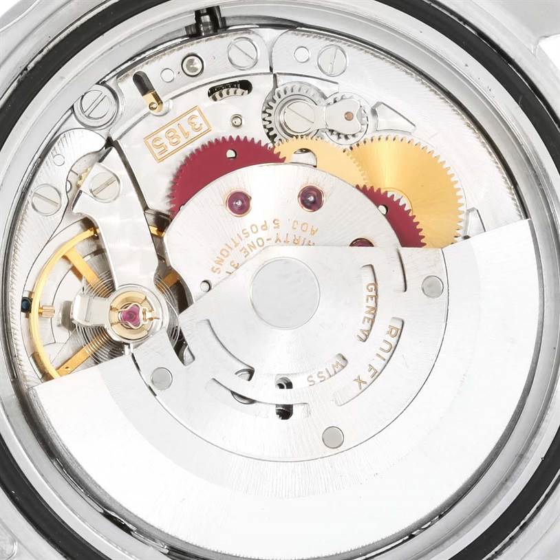 The image shows a close-up view of the movement mechanism of a Rolex GMT-Master 16710 Men's Stainless Steel Black Dial 16710 Men's Stainless Steel Black Dial watch.
