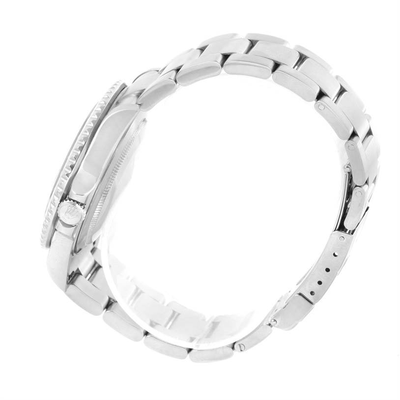 The image shows a side view of the Rolex GMT-Master 16710 Men's Stainless Steel Black Dial 16710 Men's Stainless Steel Black Dial watch, highlighting the case, crown, bezel, and bracelet.