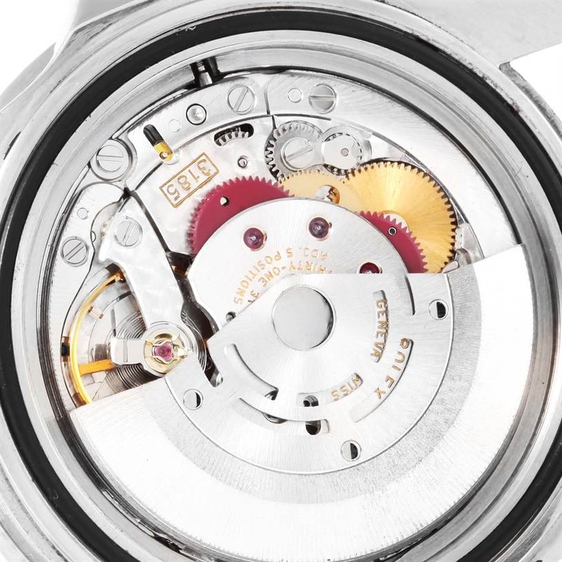 This image shows a close-up of the Rolex GMT-Master 16710 Men's Stainless Steel Black Dial 16710 Men's Stainless Steel Black Dial's internal movement components from the back.