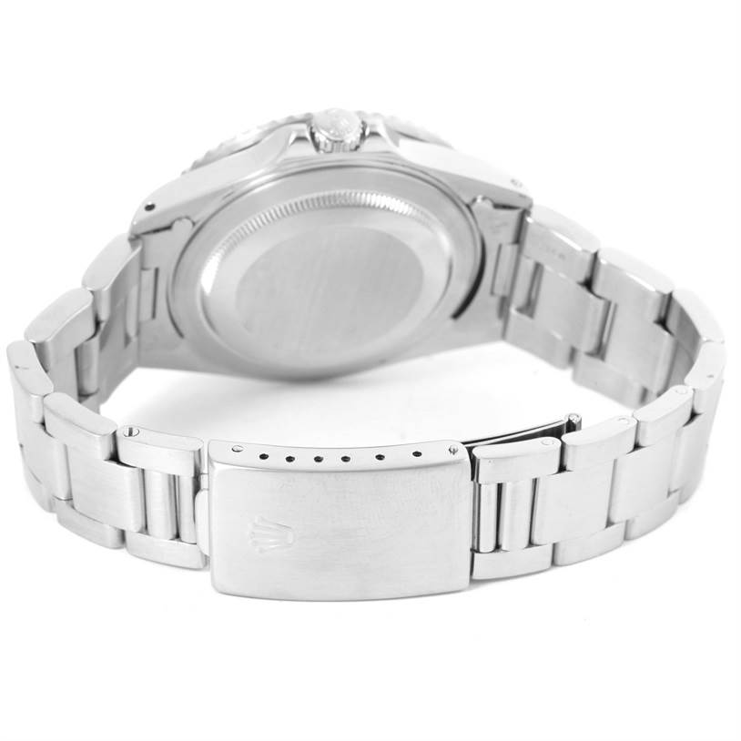 The image shows the back and bracelet of a Rolex GMT-Master 16710 Men's Stainless Steel Black Dial 16710 Men's Stainless Steel Black Dial watch, specifically highlighting the case back and clasp.