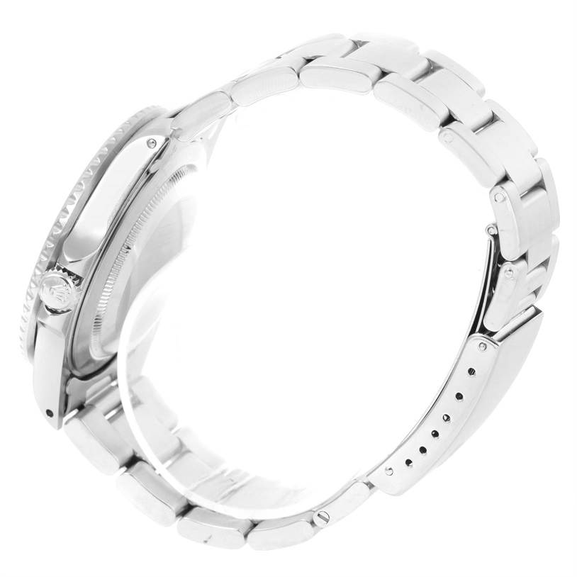 The image shows a side profile of a Rolex GMT-Master 16710 Men's Stainless Steel Black Dial 16710 Men's Stainless Steel Black Dial watch, highlighting its bracelet, crown, and case.