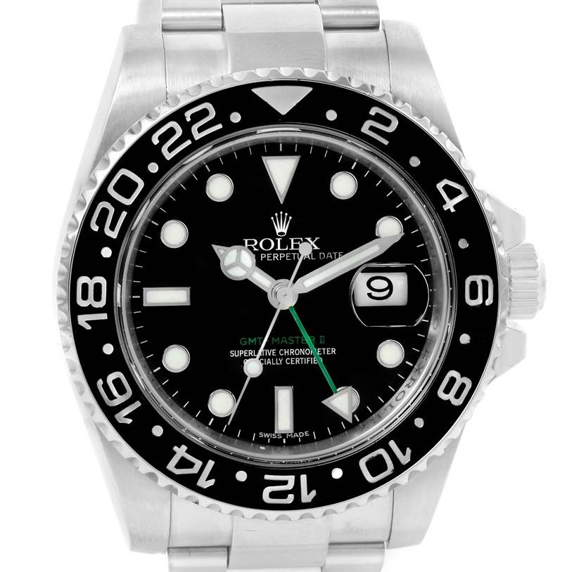 This image shows the dial and bezel of a Rolex GMT-Master 116710 Men's Stainless Steel Black Dial 116710 Men's Stainless Steel Black Dial II watch from a frontal view.