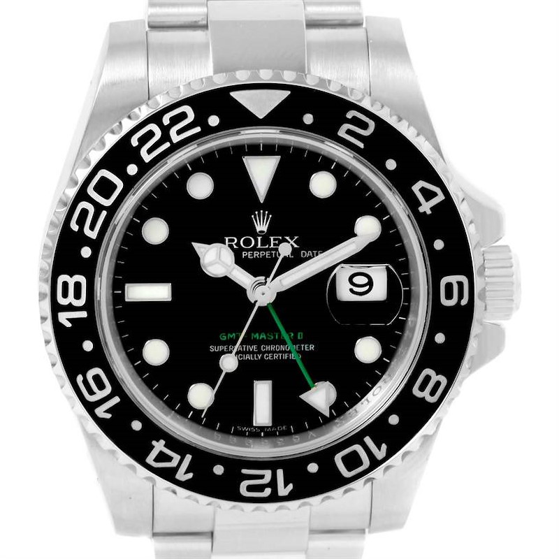 The image shows a front view of a Rolex GMT-Master II watch, displaying the dial, bezel, and bracelet.