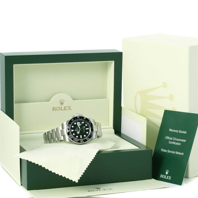 The Rolex GMT-Master 116710BKSO Men's Stainless Steel Black Dial 116710BKSO Men's Stainless Steel Black Dial watch is shown from a front angle, inside an open box with warranty booklet and certification.