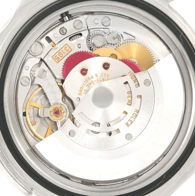 The image shows the intricate internal mechanism and gears of the Rolex GMT-Master 16710 Men's Stainless Steel Black Dial 16710 Men's Stainless Steel Black Dial model, viewed from the back.