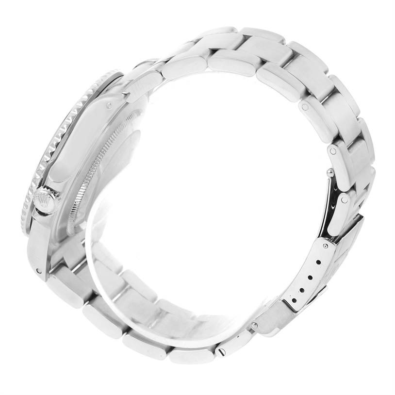 This is a side angle view of a Rolex GMT-Master 16710 Men's Stainless Steel Black Dial 16710 Men's Stainless Steel Black Dial watch, highlighting the bracelet and crown.