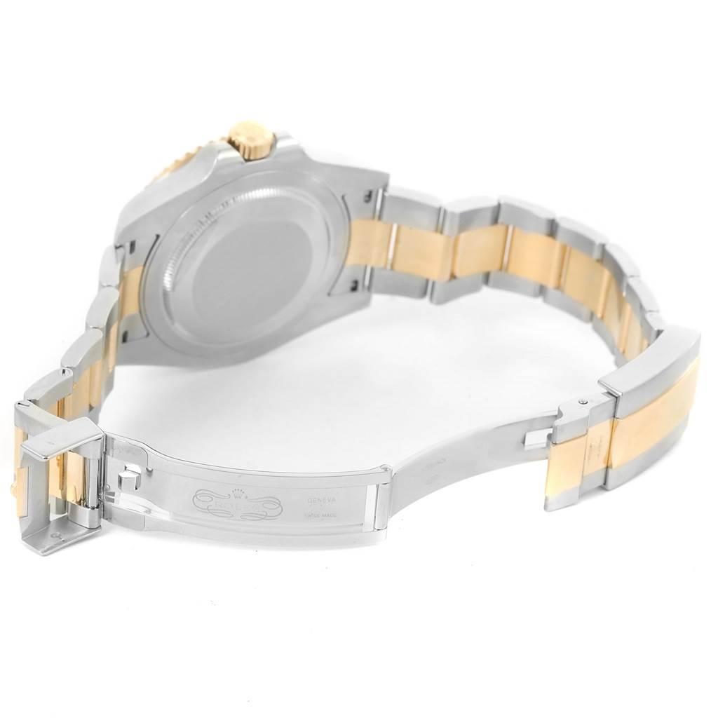 The image shows the back and clasp of a Rolex GMT-Master 116713 Men's Stainless Steel Black Dial 116713 Men's Stainless Steel Black Dial watch, highlighting its two-tone metal bracelet.