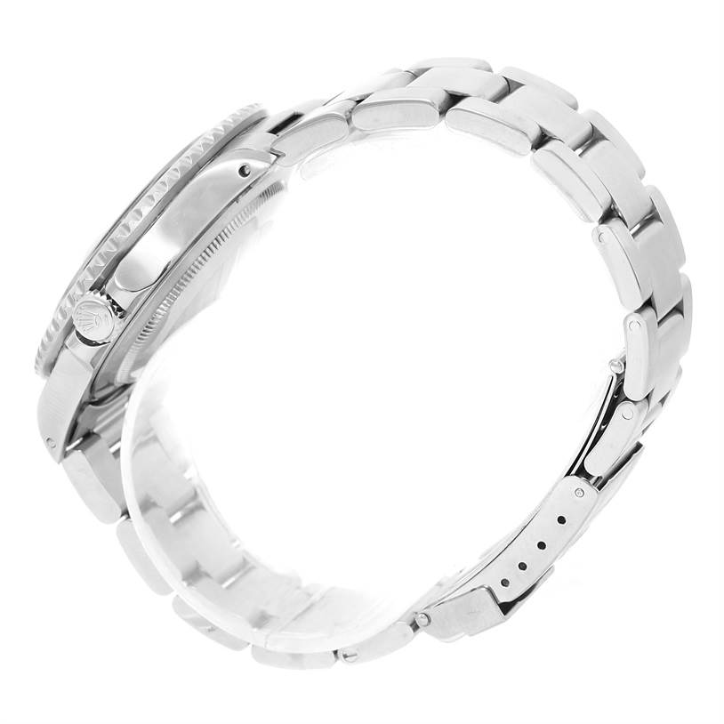 This side view of the Rolex GMT-Master 16700 Men's Stainless Steel Black Dial 16700 Men's Stainless Steel Black Dial watch shows the bracelet, clasp, and crown.