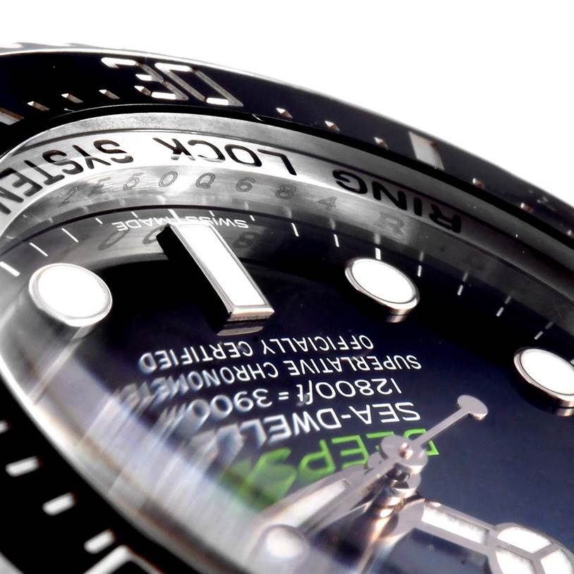 The image shows a close-up of the dial and bezel of a Rolex GMT-Master 116660 Men's Stainless Steel Blue Dial 116660 Men's Stainless Steel Blue Dial watch, highlighting the inscriptions and markers.