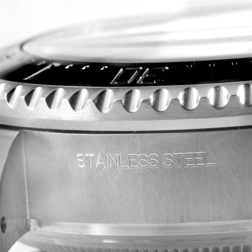 The image shows a close-up of the stainless steel case and bezel of the Rolex GMT-Master 116660 Men's Stainless Steel Blue Dial 116660 Men's Stainless Steel Blue Dial watch.