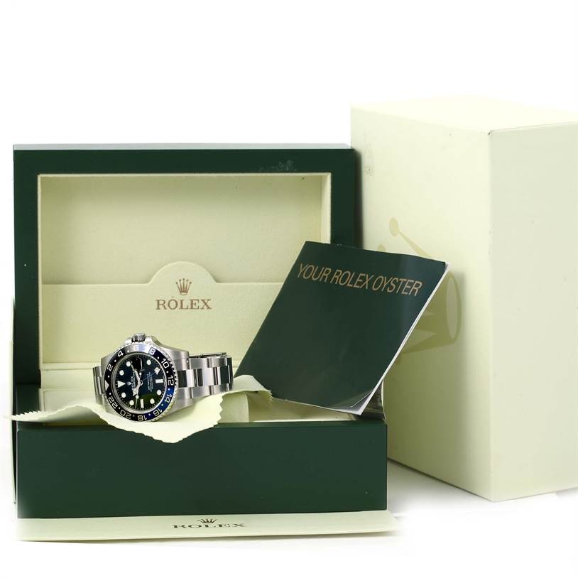 The image shows a Rolex GMT-Master 116710 Men's Stainless Steel Black Dial 116710 Men's Stainless Steel Black Dial watch placed inside its open box with a booklet labeled "Your Rolex Oyster."