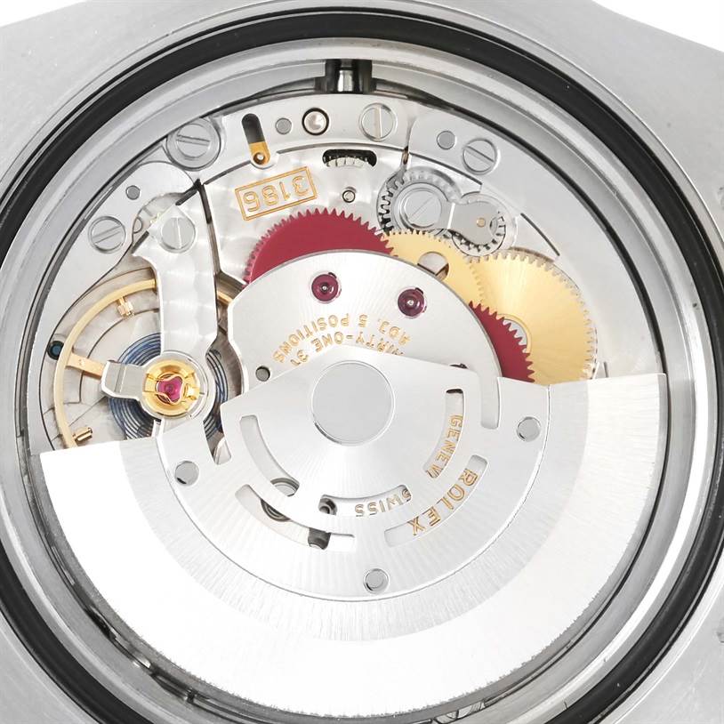 This image shows a close-up view of the movement and internal mechanisms of a Rolex GMT-Master 116710 Men
s Stainless Steel Black Dial 116710 Men
s Stainless Steel Black Dial watch.