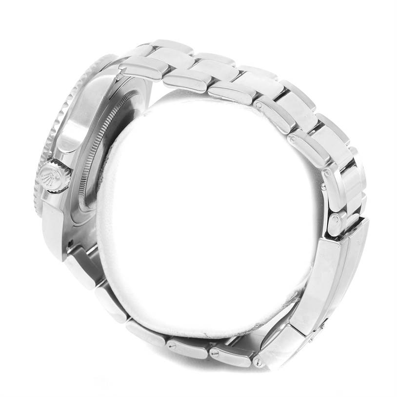 This image shows a side view of a Rolex GMT-Master 116710 Men
s Stainless Steel Black Dial 116710 Men
s Stainless Steel Black Dial watch, focusing on the crown and bracelet.